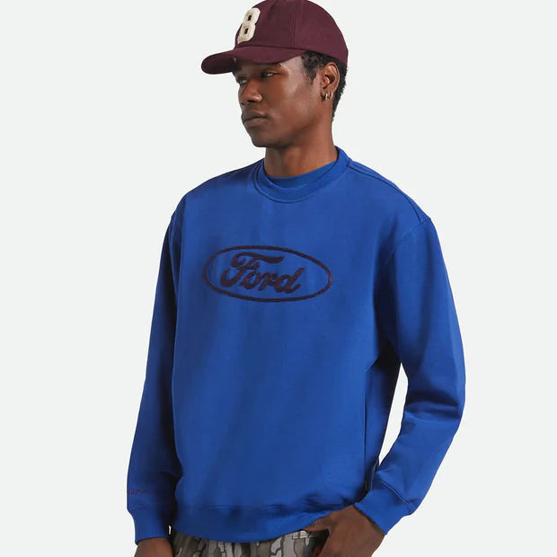 Person wearing a blue Ford sweatshirt on a white background