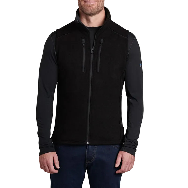 Man wearing a black jacket on a white background